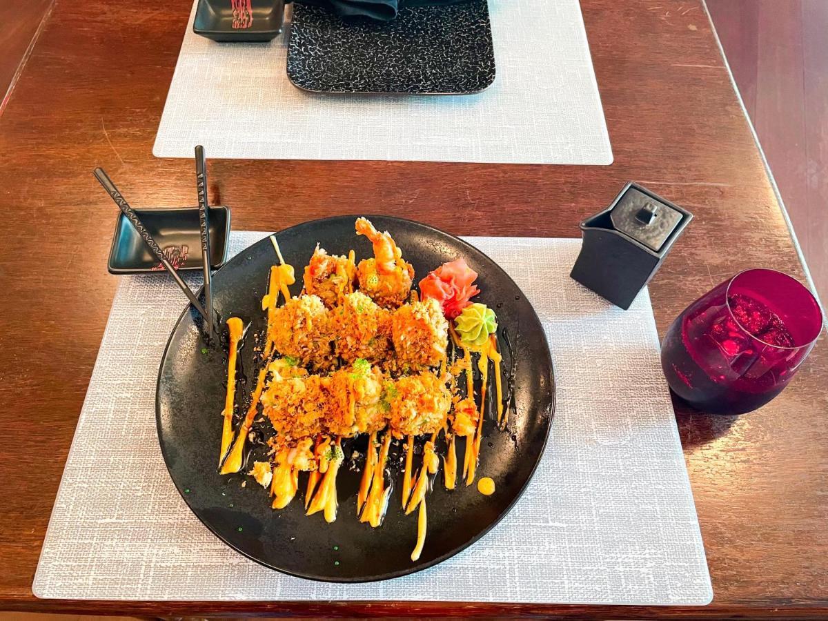 Moevenpick Grand Al Bustan Hotel Dubai Ngoại thất bức ảnh A plate of tempura