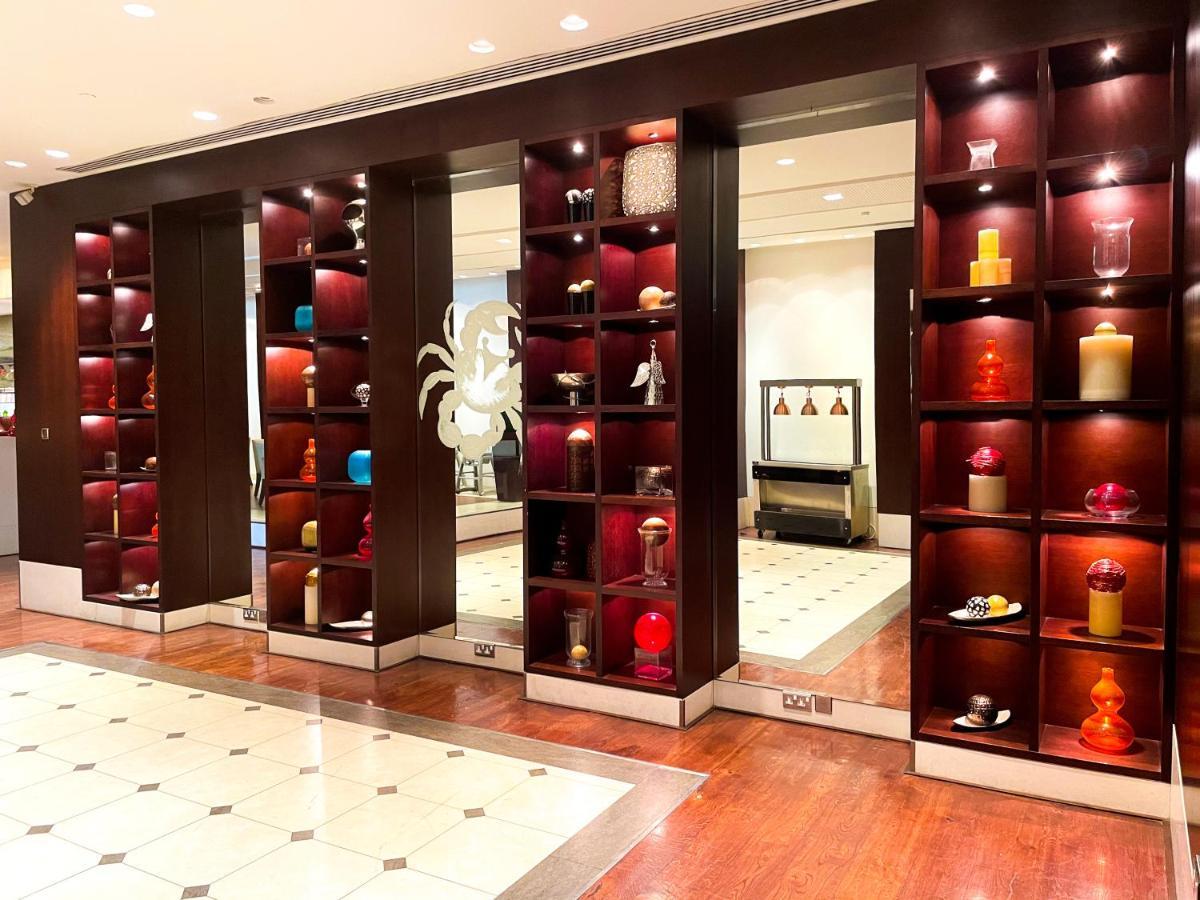 Moevenpick Grand Al Bustan Hotel Dubai Ngoại thất bức ảnh The interior of the hotel